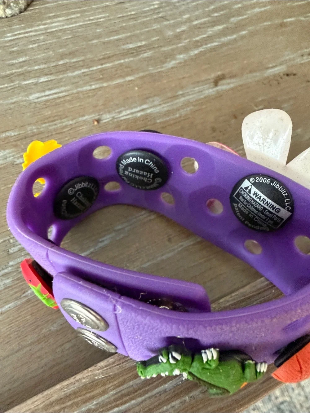 Jibbitz Purple Shoe Charm with Pink Flower and Yellow Accent